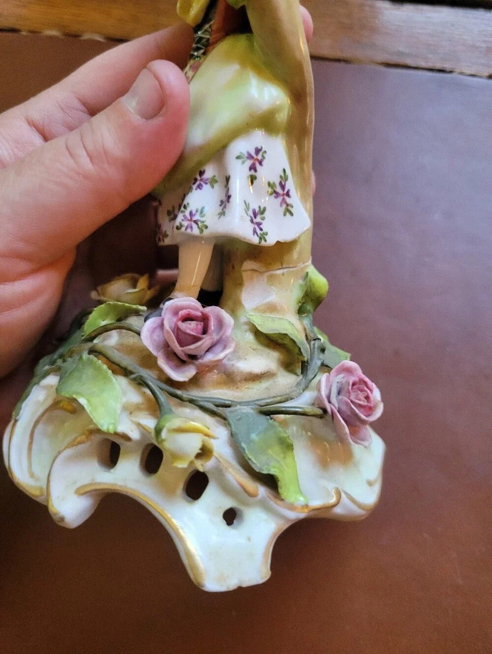 antique porcelain figurine, likely German from around 1900-repaired